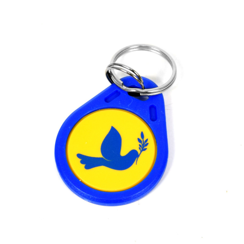 Купити Брелок ATIS RFID KEYFOB MF Peace. Системи безпеки для дому та офісу. Магазин RG-Group. Системи відеонагляду та охоронні сигналізації. Продаж та послуги встановлення